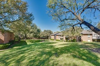 Large grassy space in front of building